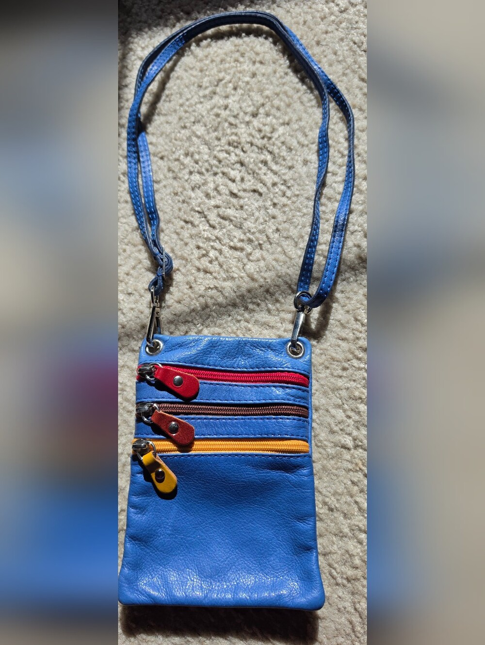 Blue Multi-Zip Crossbody Bag with Colorful Zippers